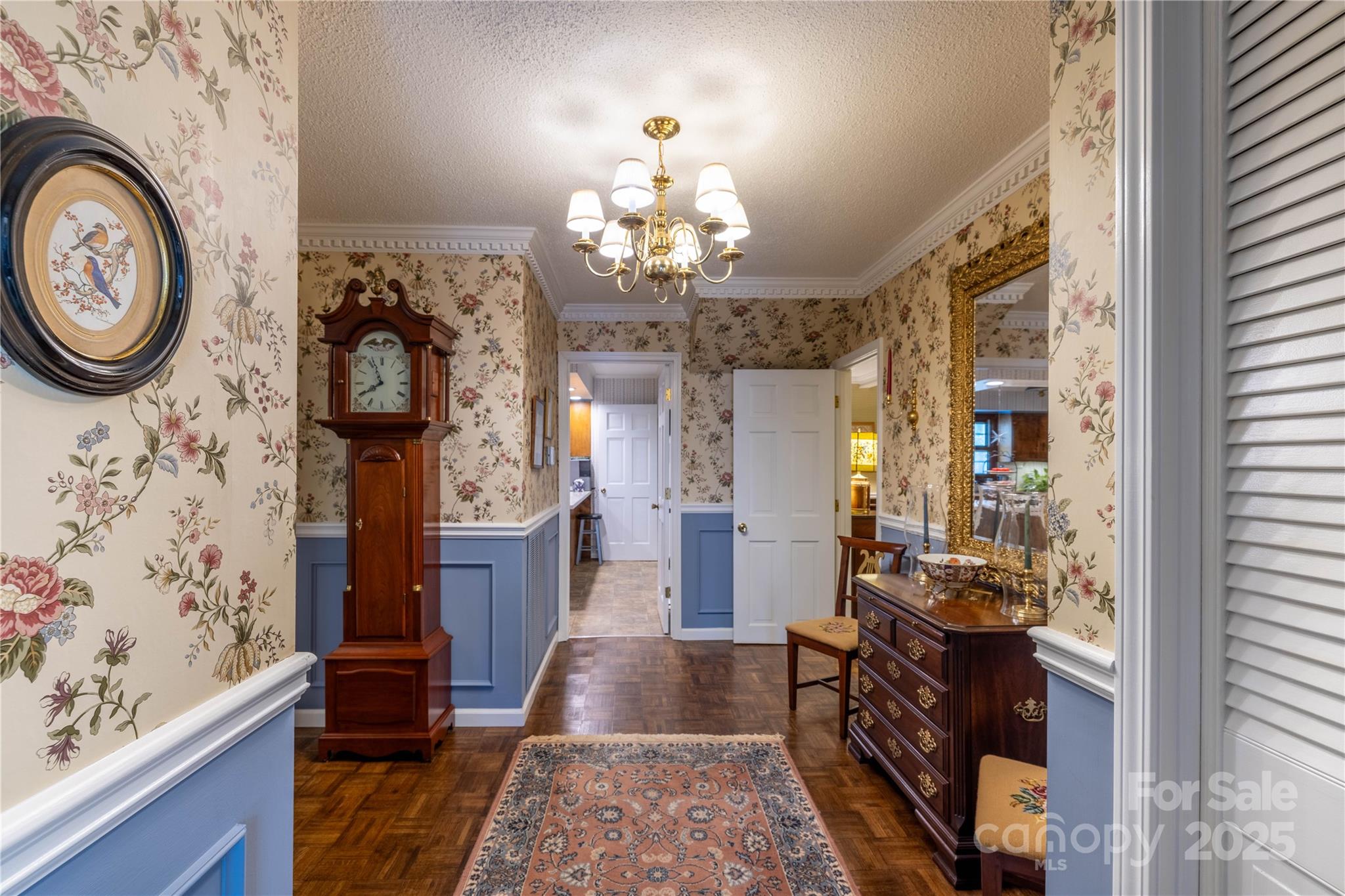42765 Caudle Road Richfield, NC 28137 - Photo 12 of 37 a view of a entryway with furniture and chandelier