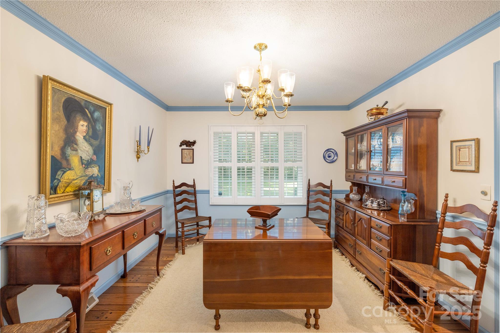 42765 Caudle Road Richfield, NC 28137 - Photo 16 of 37 a living room with fireplace furniture and a large window