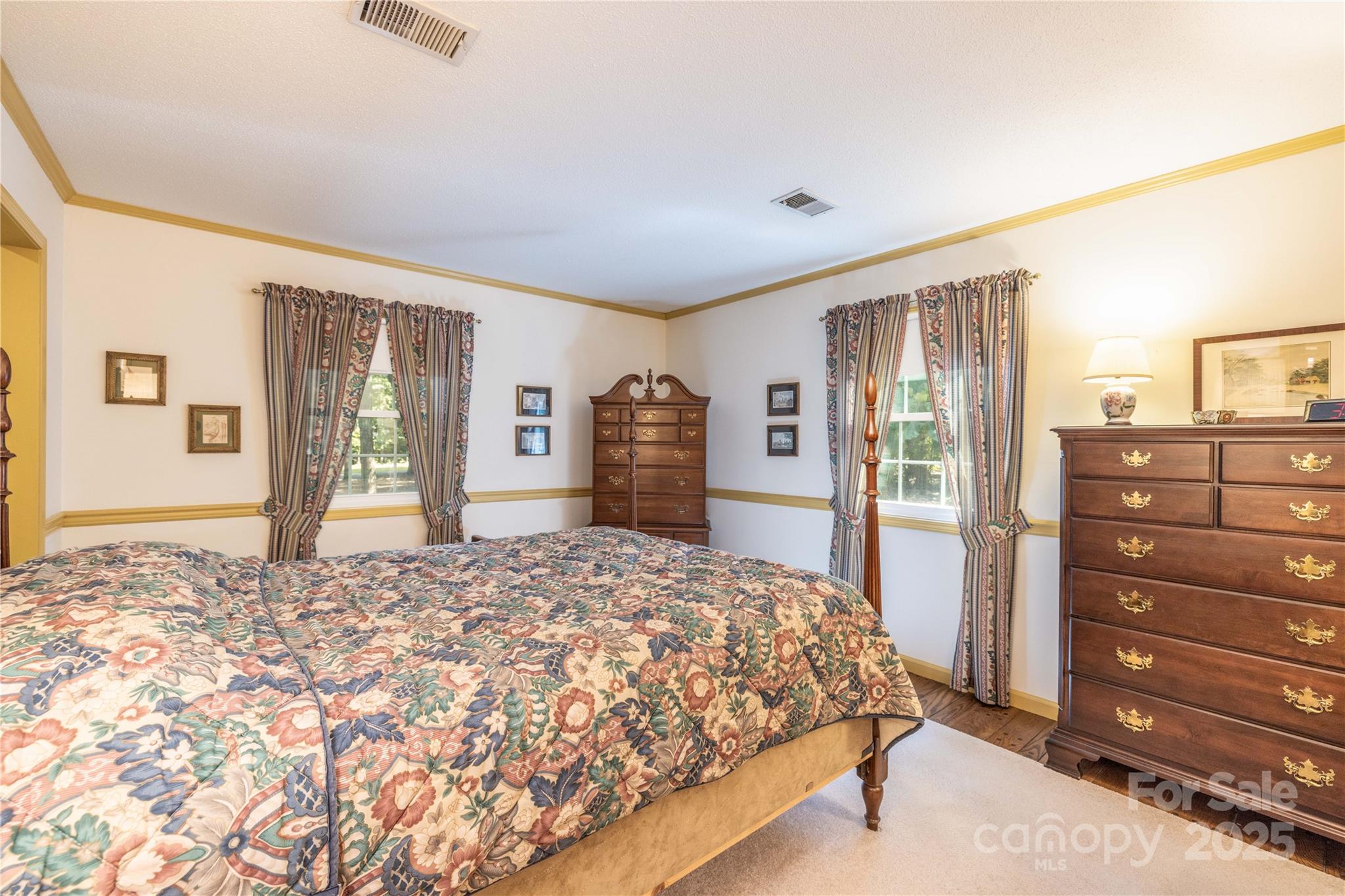 42765 Caudle Road Richfield, NC 28137 - Photo 27 of 37 a bedroom with a bed and a dresser