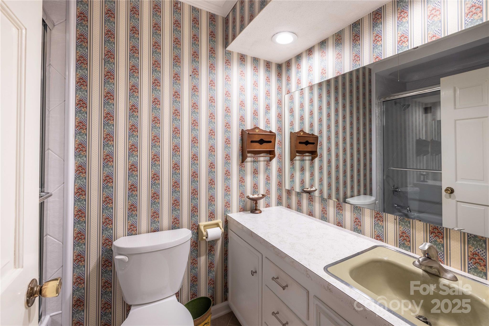42765 Caudle Road Richfield, NC 28137 - Photo 34 of 37 a bathroom with a sink toilet and shower