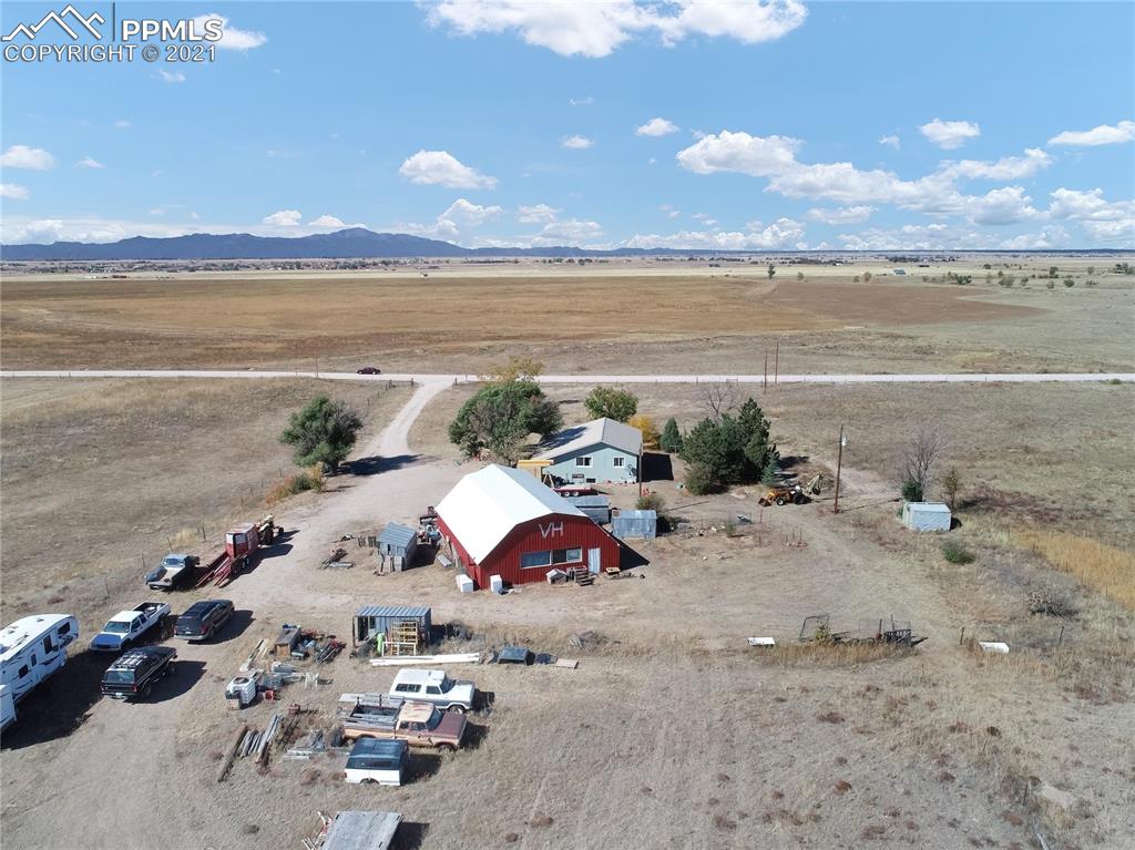 8155 North Log Road Peyton, CO 80831 - Photo 2 of 29 a view of beach and ocean view