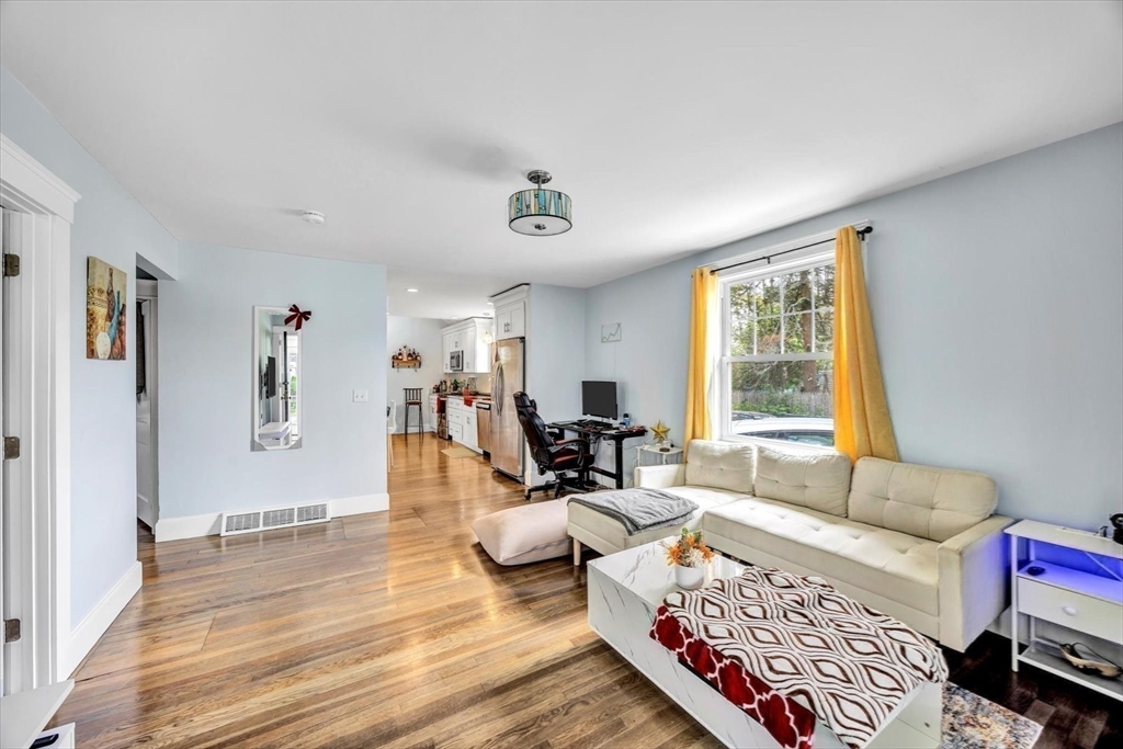 60 Grove Street Barnstable, MA 02601 - Photo 15 of 34 a living room with furniture and a window