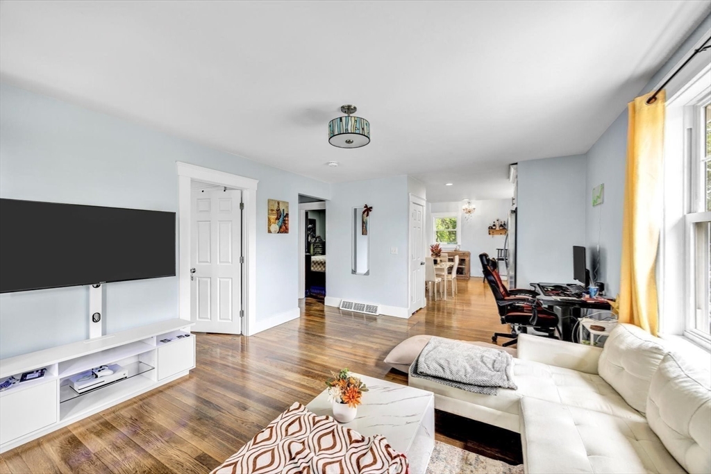 60 Grove Street Barnstable, MA 02601 - Photo 16 of 34 a living room with furniture and a flat screen tv