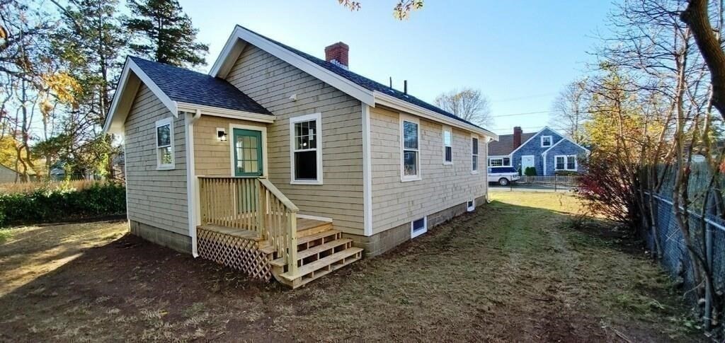 60 Grove Street Barnstable, MA 02601 - Photo 32 of 34 a view of a house with a yard