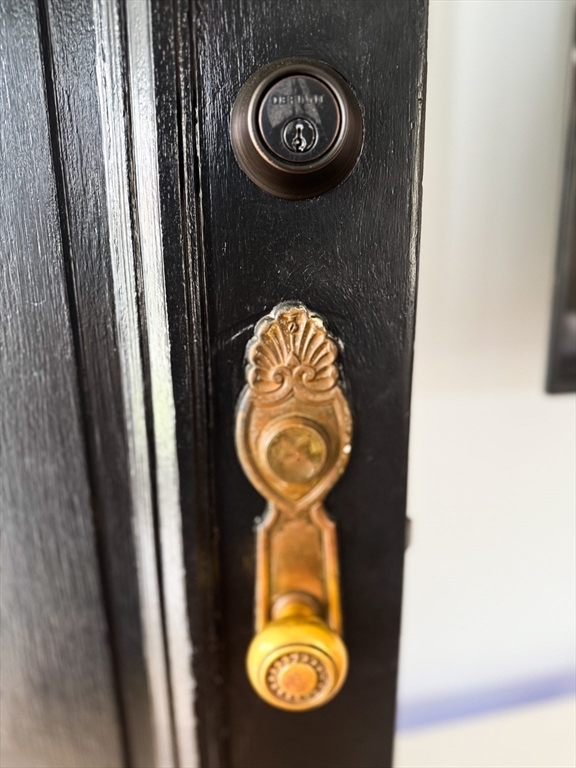 60 Grove Street Barnstable, MA 02601 - Photo 33 of 34 a view of a hallway with washer and dryer