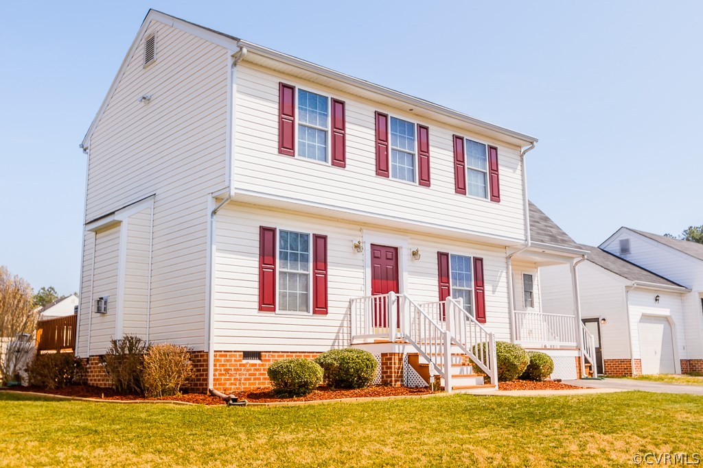 5301 Hackney Road North Chesterfield, VA 23234 - Photo 2 of 29 a front view of a house with a yard