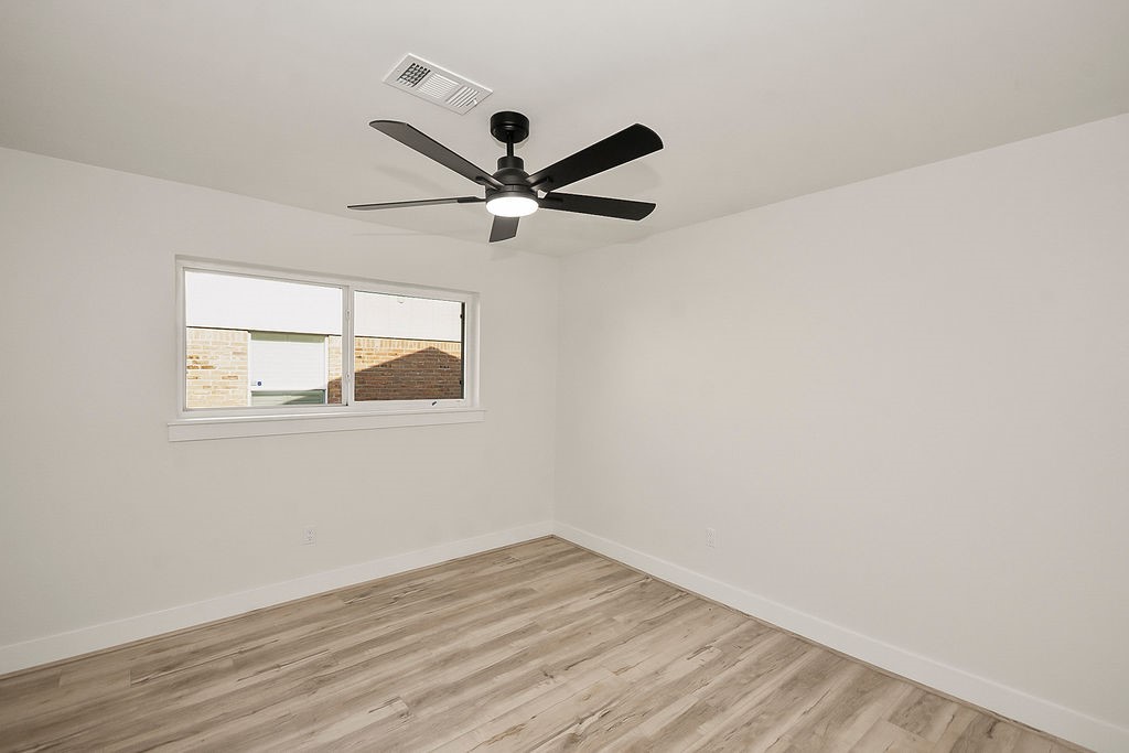 6106 Rutherglenn Drive Houston, TX 77096 - Photo 32 of 41 Another view of the spacious bedroom offering flexibility for guests, family, or workspace needs.