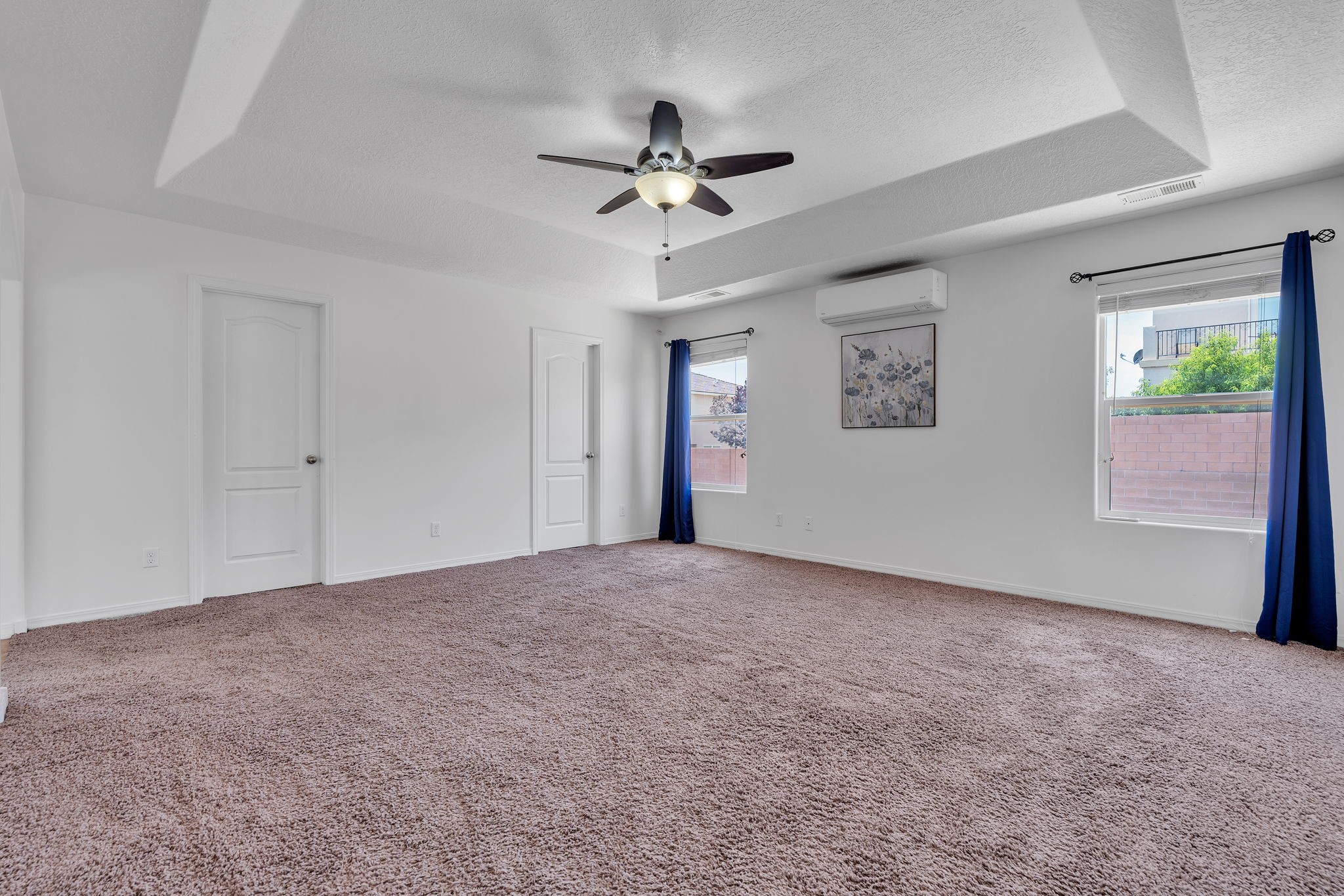6914 Wrangell Loop Northeast Rio Rancho, NM 87144 - Photo 34 of 61 Primary Bedroom