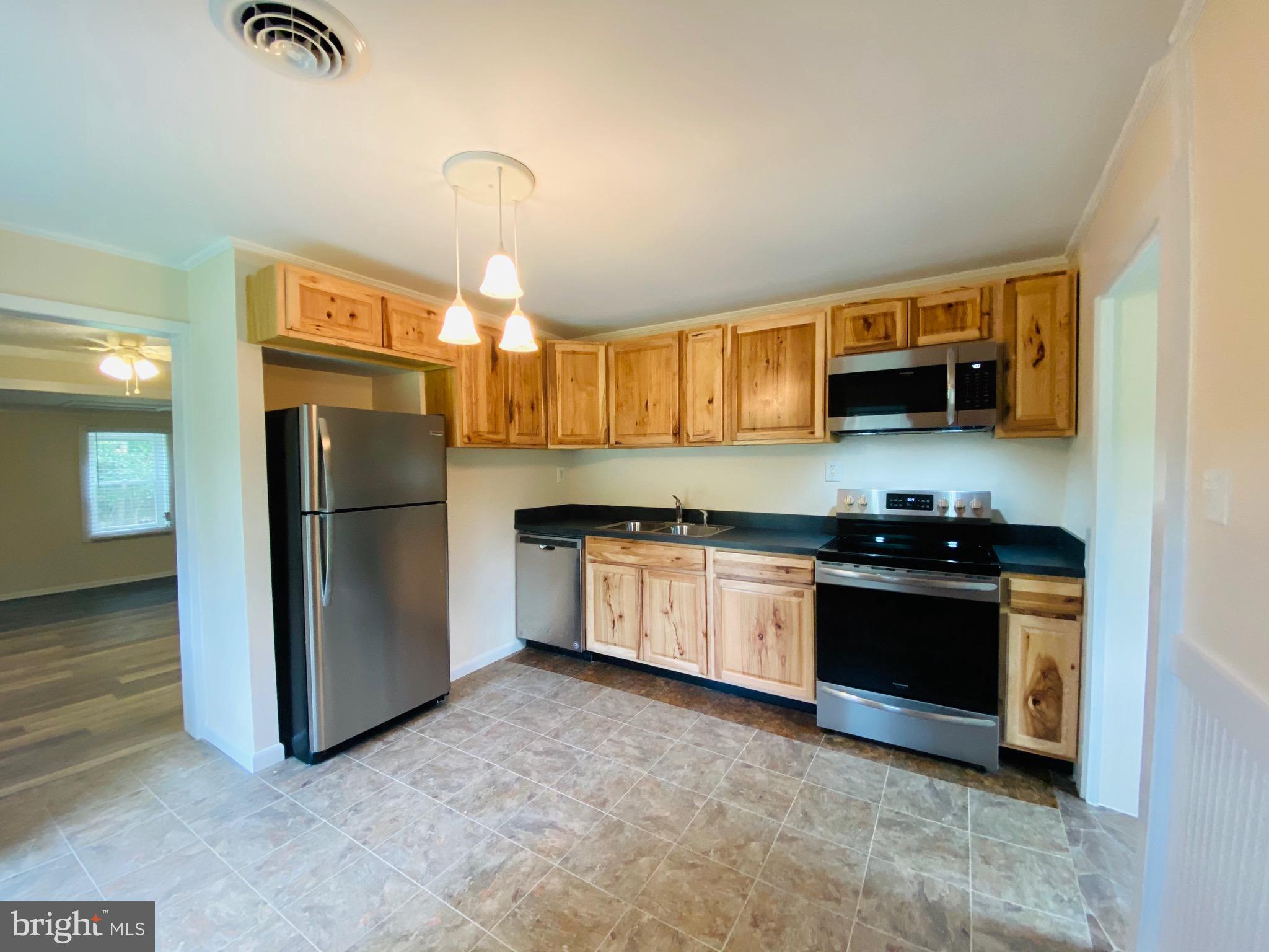 1054 Jordan Springs Road Stephenson, VA 22656 - Photo 2 of 32 New kitchen with natural hickory cabinets