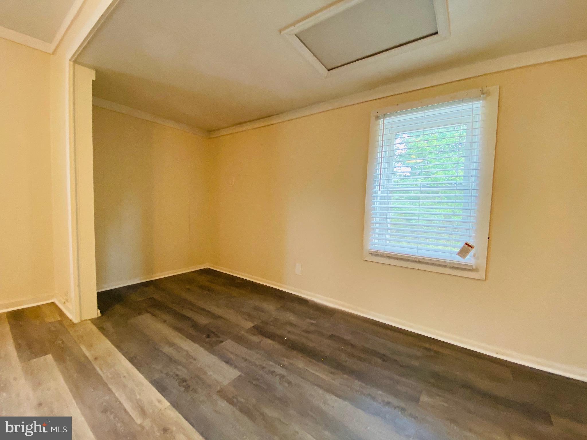 1054 Jordan Springs Road Stephenson, VA 22656 - Photo 18 of 32 Bonus area with different vinyl plank flooring