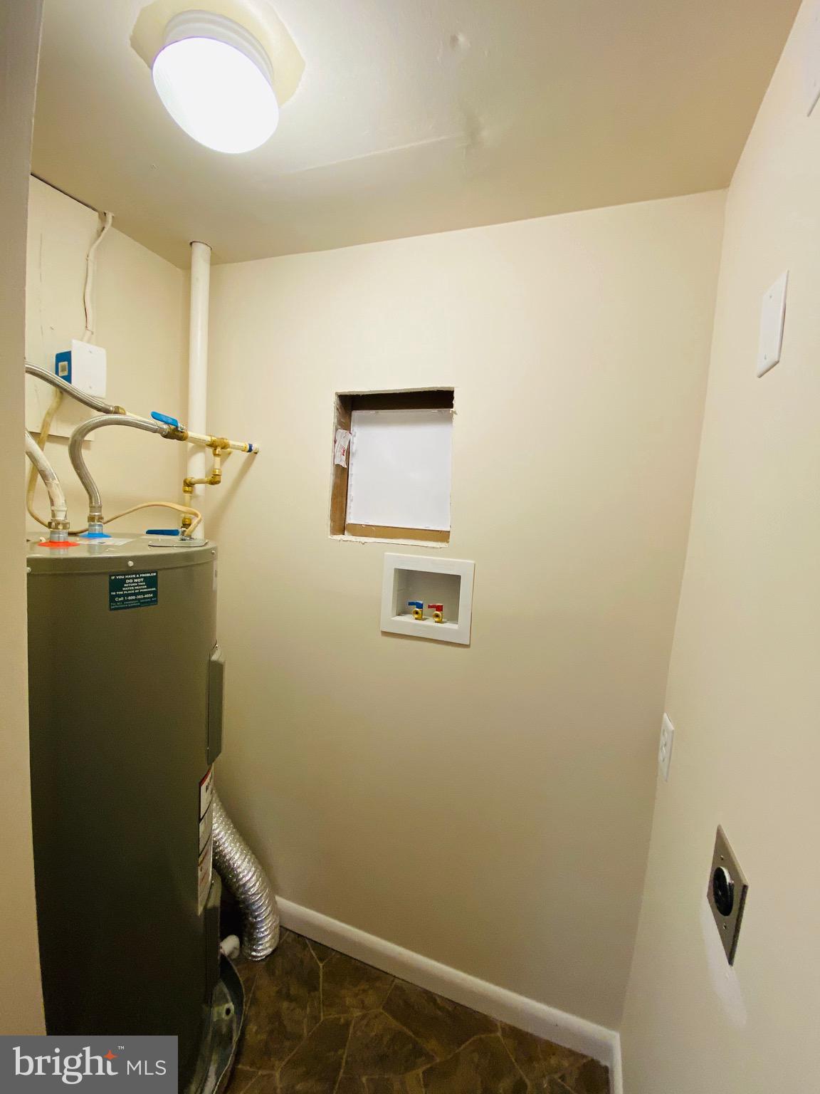 1054 Jordan Springs Road Stephenson, VA 22656 - Photo 19 of 32 Laundry closet with new water heater
