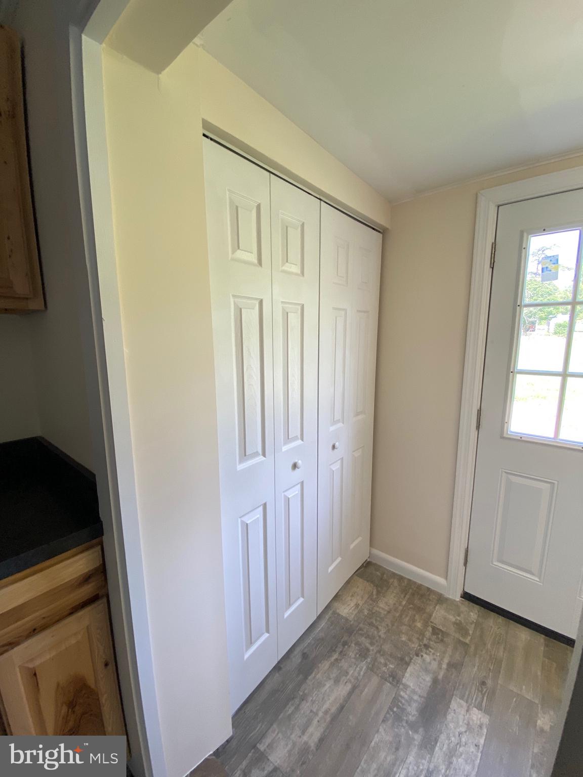 1054 Jordan Springs Road Stephenson, VA 22656 - Photo 10 of 32 Side door mudroom and electrical panel closet