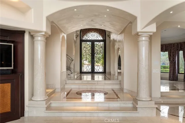 a kitchen with granite countertop a stove and a sink