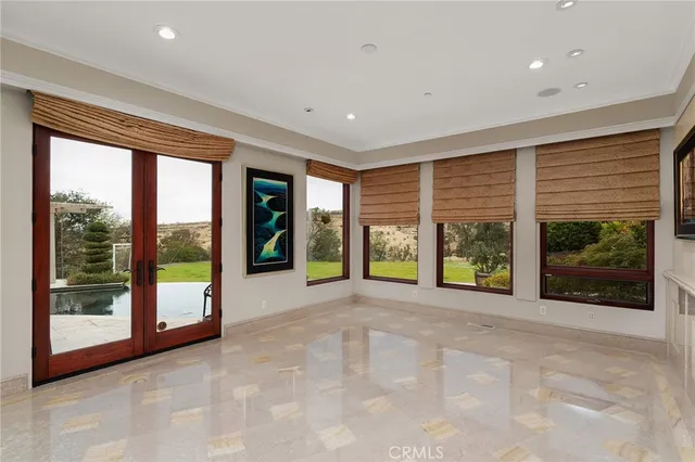 a living room with furniture and a projector