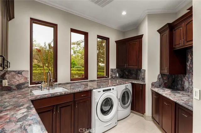 a view of a bathroom with a tub and window
