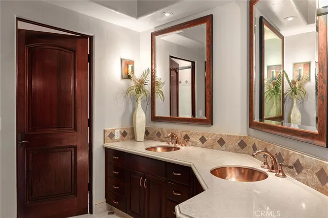 a view of a bathroom with bathtub and window