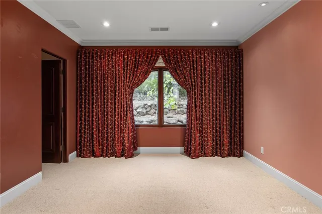a living room with furniture wooden floor and a flat screen tv