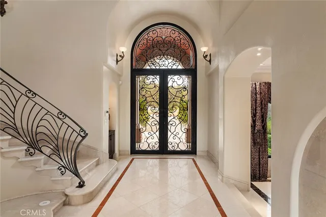 a view of staircase with white walls