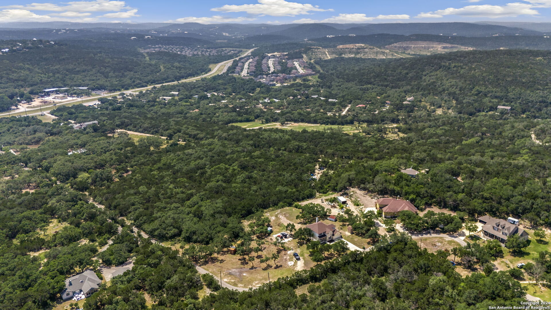 0 Bandera Road Helotes, TX 78023 - Photo 3 of 7 a view of a field with a tree