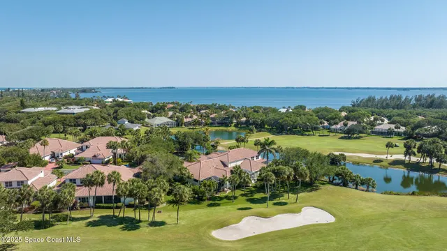 a view of lake and houses with outdoor space