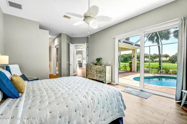 a view of a golf course with a lake view