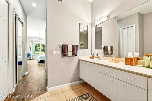 a view of a livingroom with furniture and a flat screen tv