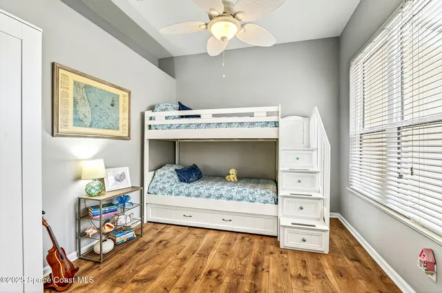 a bathroom with a toilet a sink and a window