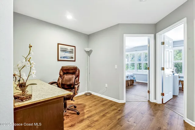 a bathroom with a double vanity sink toilet and shower