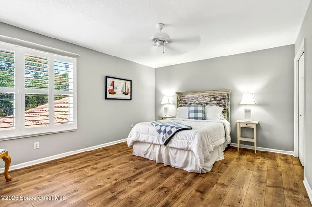 an aerial view of a city and mountain view in back