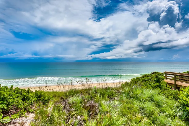 a view of beach and ocean
