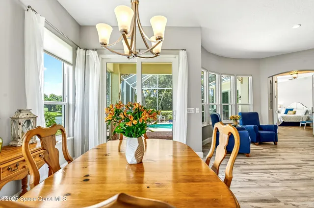 a view of a swimming pool with a patio