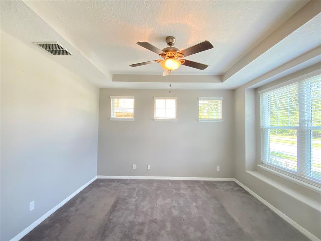 8500 Iron Mountain Trail Windermere, FL 34786 - Photo 16 of 40 a view of an empty room with a window