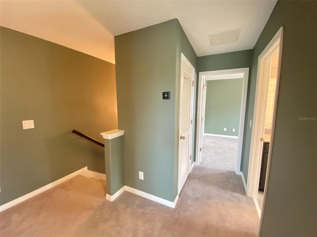 8500 Iron Mountain Trail Windermere, FL 34786 - Photo 29 of 40 a view of a big room with windows