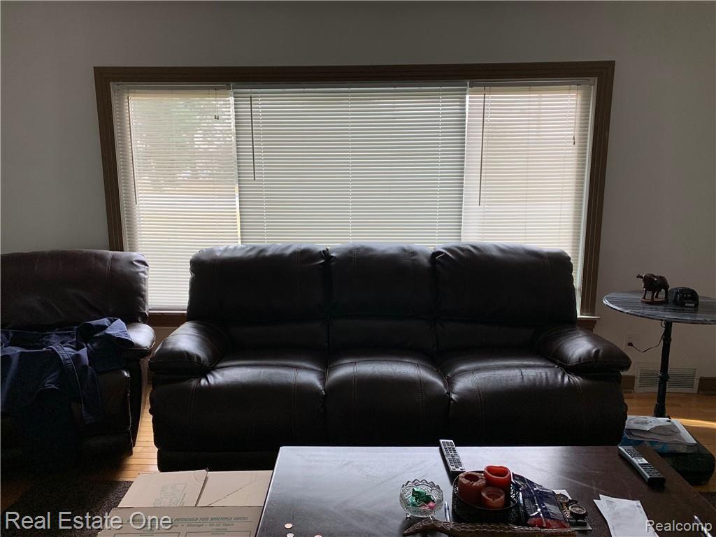 20472 Wick Road Taylor, MI 48180 - Photo 5 of 24 The living room is brought to life by the sunlight thanks to this great window. MOST furniture included!