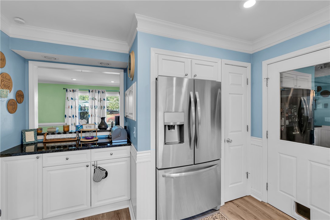 1305 Hanover Road Anderson, SC 29621 - Photo 10 of 29 Elegant crown molding and durable wood-look flooring enhance this classic culinary workspace.