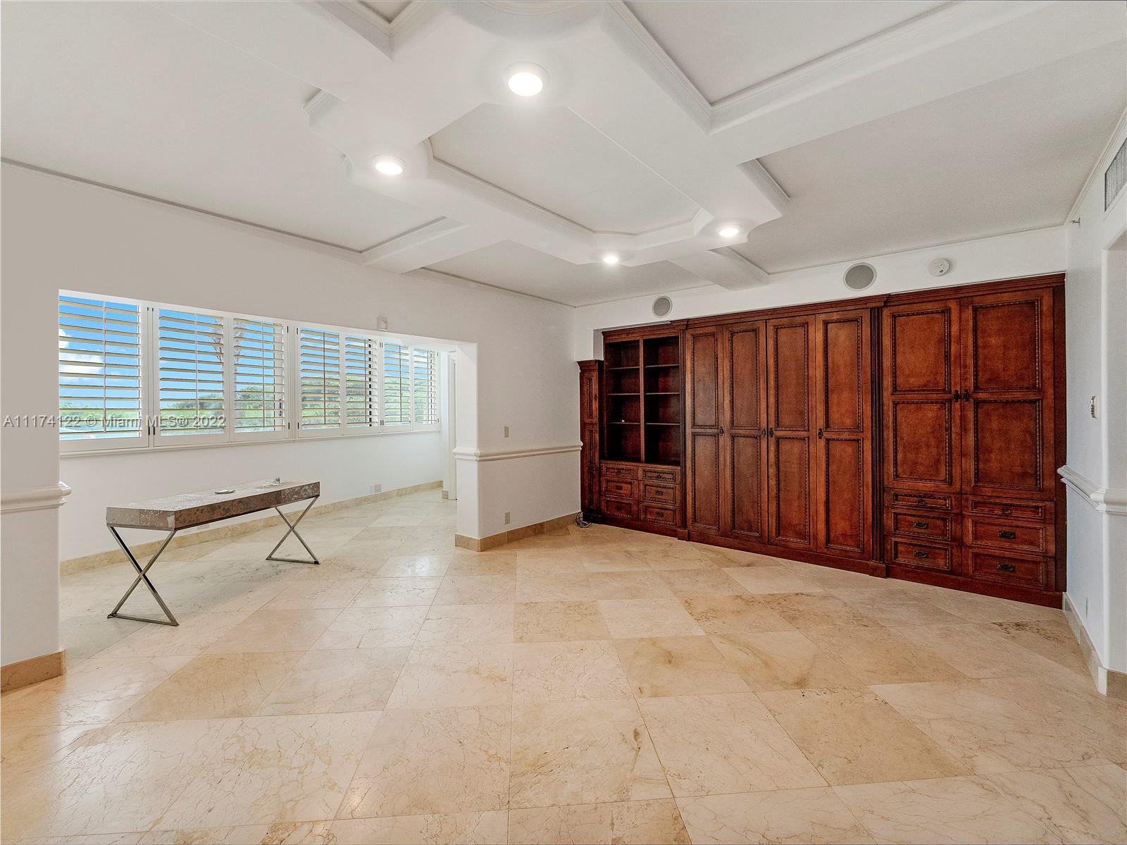 2050 Florida A1A, Unit 2 Jupiter, FL 33477 - Photo 19 of 22 an empty room with furniture and a window