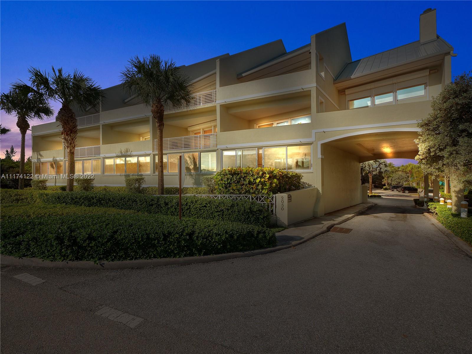2050 Florida A1A, Unit 2 Jupiter, FL 33477 - Photo 22 of 22 a view of a street with a building in the background