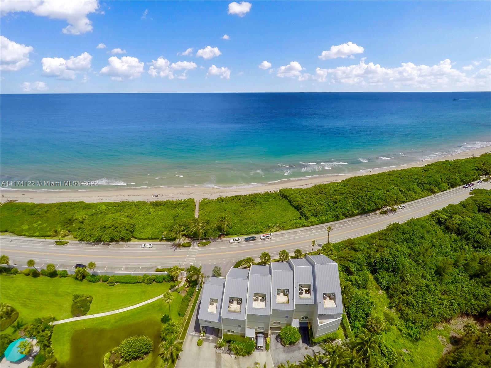 2050 Florida A1A, Unit 2 Jupiter, FL 33477 - Photo 3 of 22 an aerial view of tennis court