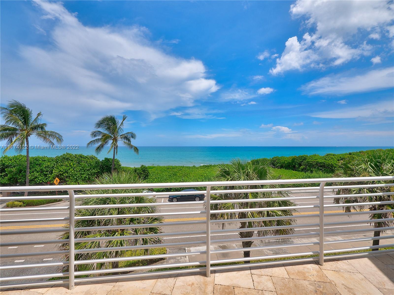 2050 Florida A1A, Unit 2 Jupiter, FL 33477 - Photo 4 of 22 a view of a balcony with an outdoor seating