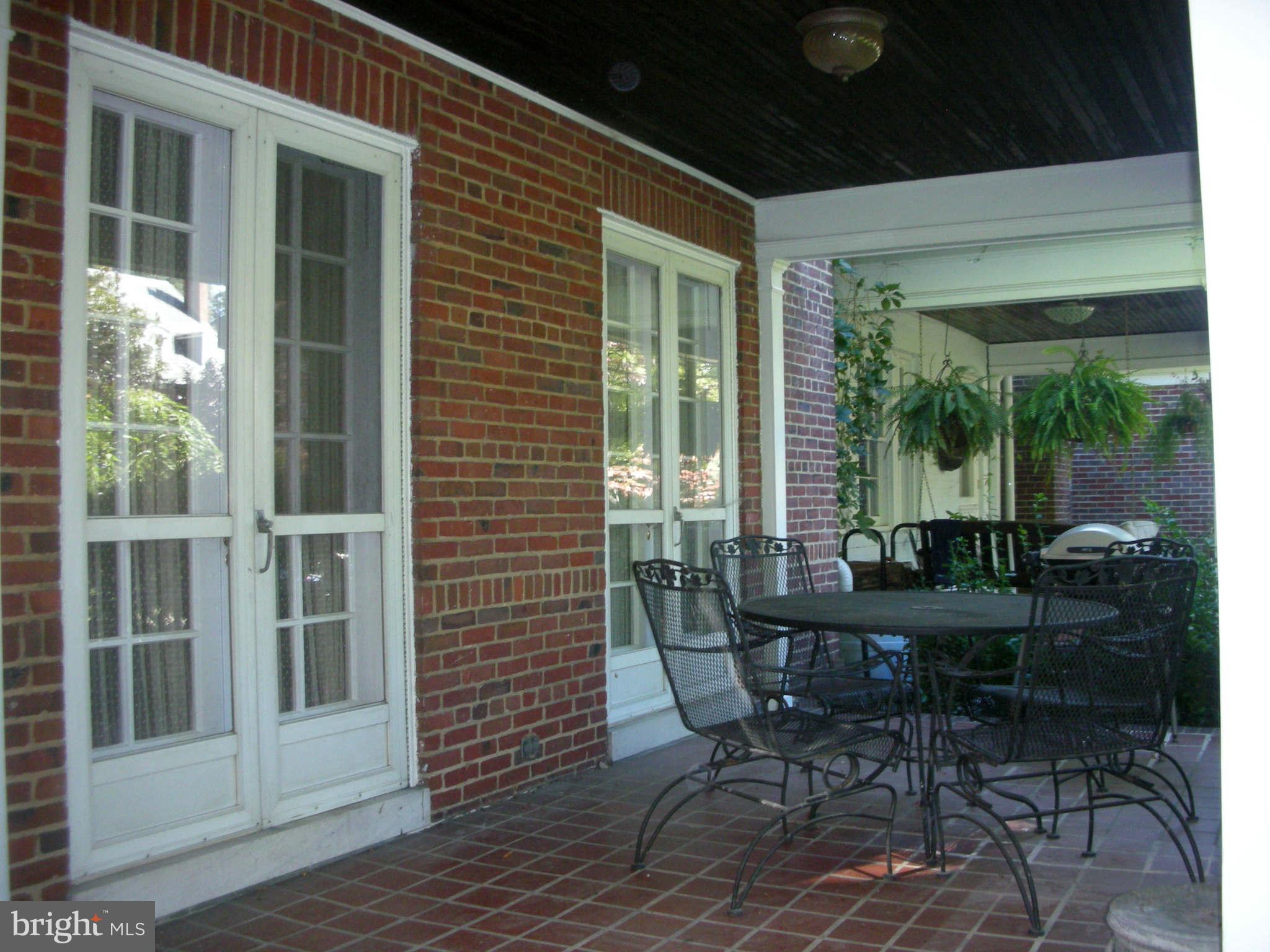 4245 Wickford Road Baltimore, MD 21210 - Photo 2 of 10 a view of a dining room with furniture and wooden floor