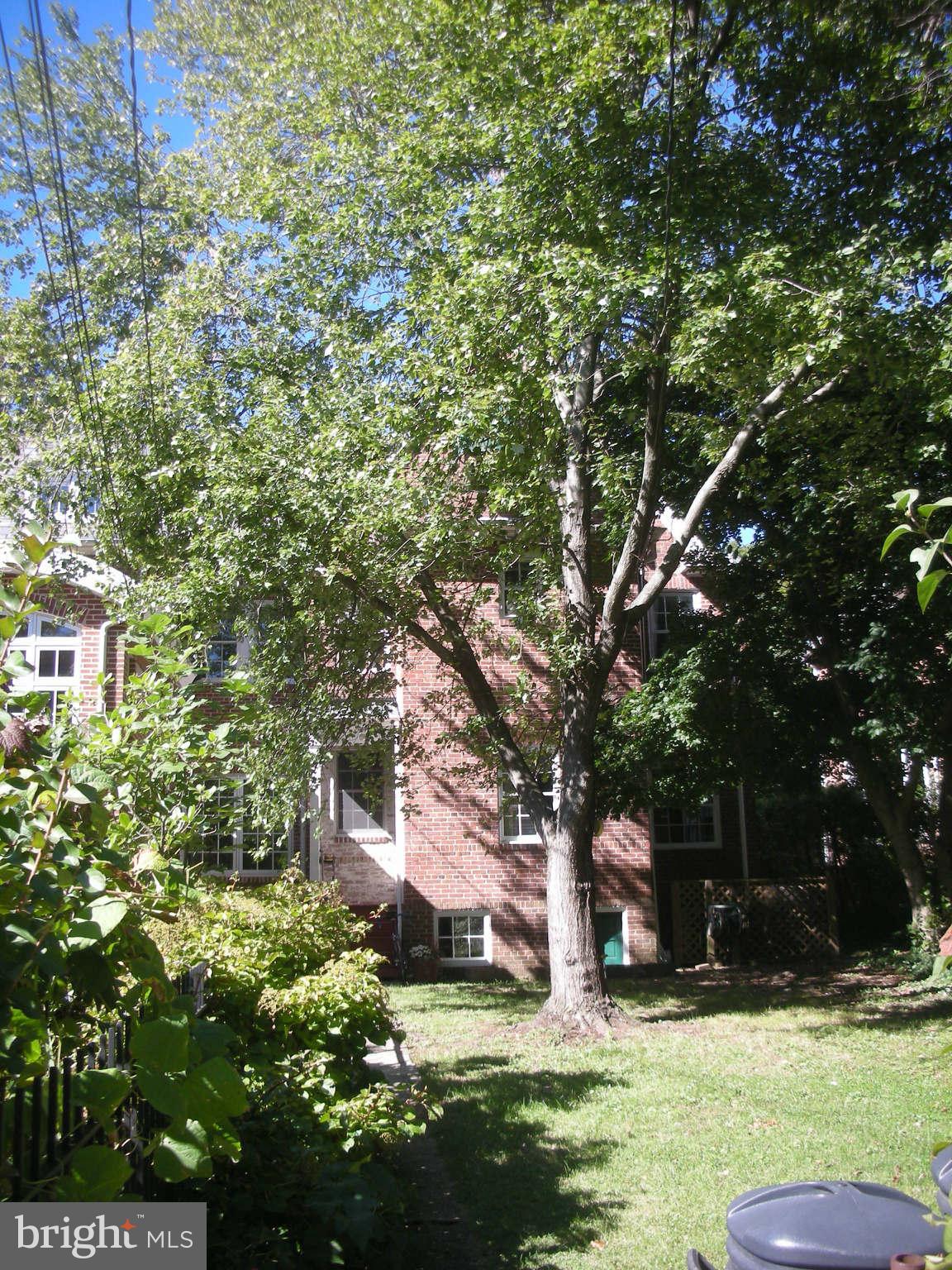 4245 Wickford Road Baltimore, MD 21210 - Photo 4 of 10 a swimming pool with outdoor seating and yard