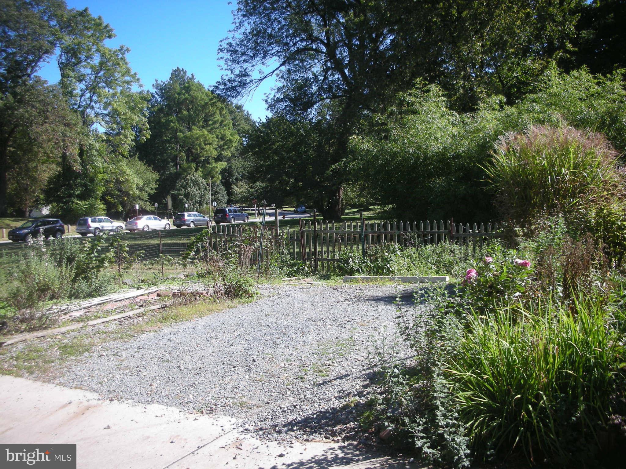 4245 Wickford Road Baltimore, MD 21210 - Photo 5 of 10 a view of a lake with a building in the background