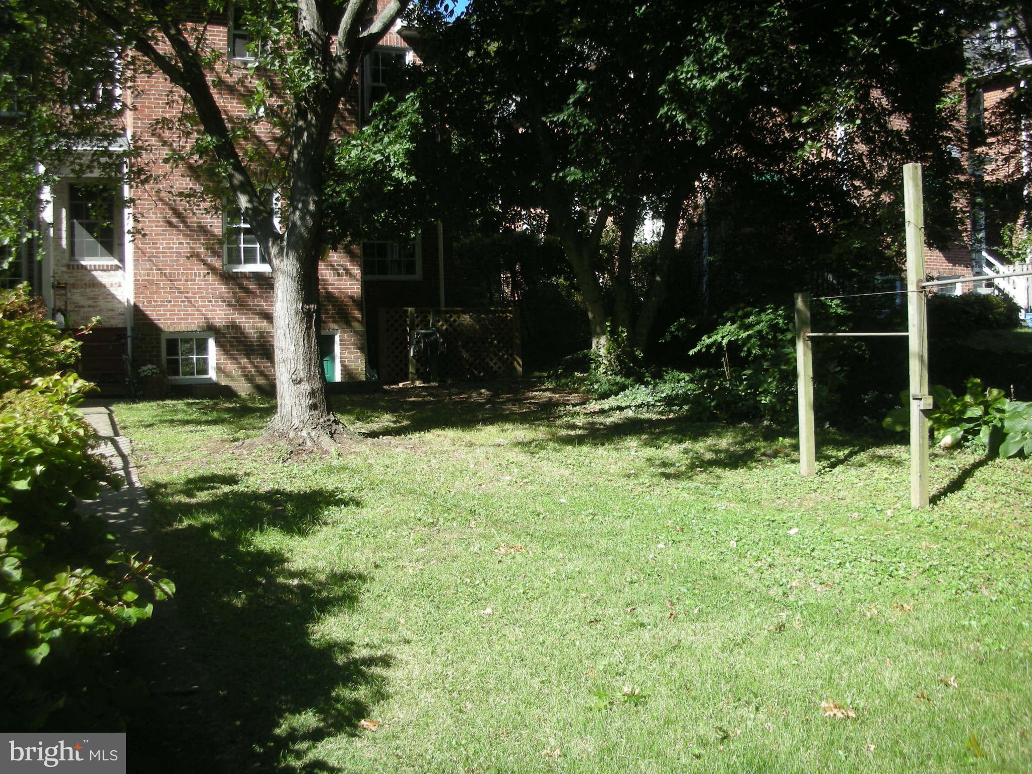 4245 Wickford Road Baltimore, MD 21210 - Photo 9 of 10 a backyard of a house with lots of green space
