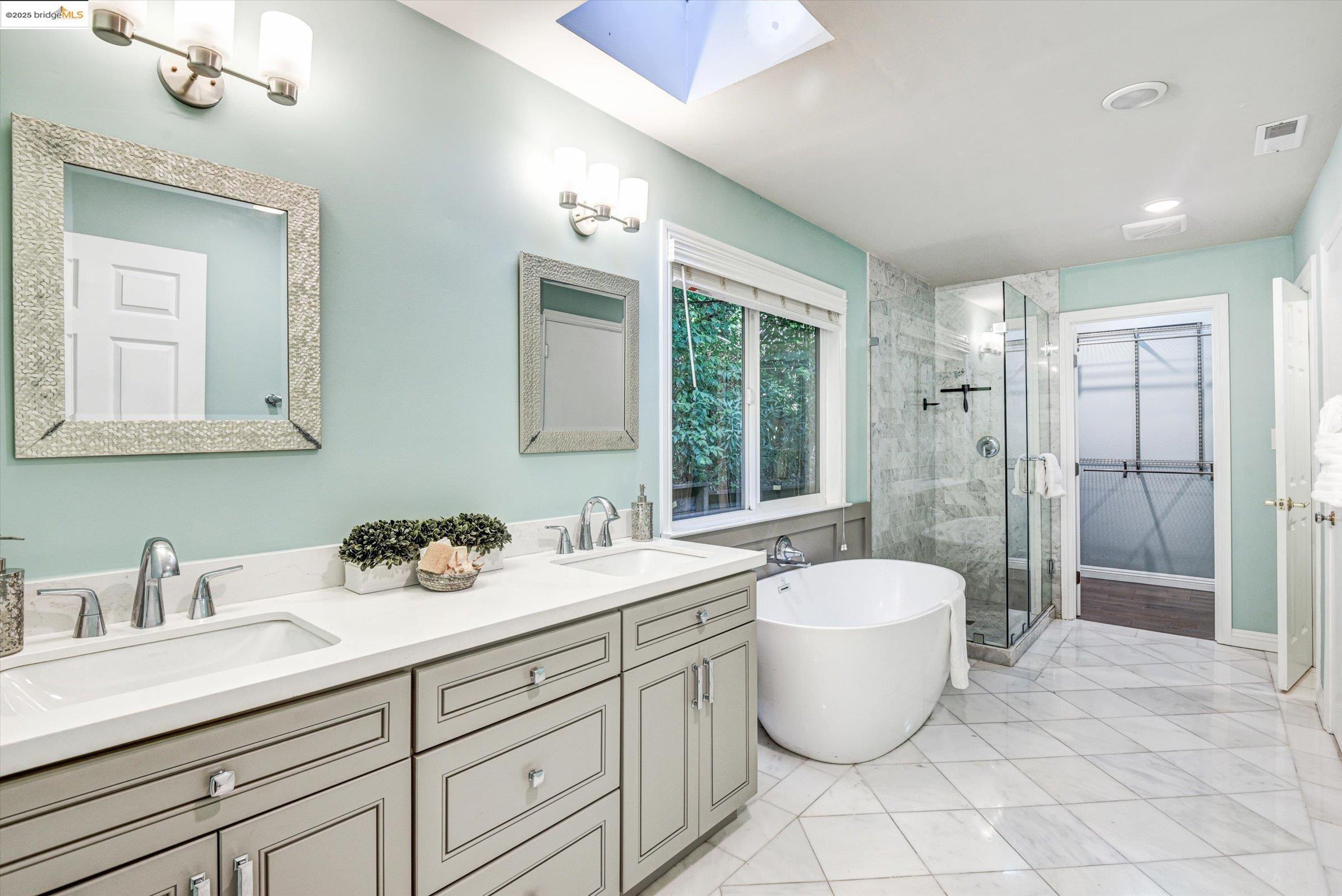 7 St Stephens Drive Orinda, CA 94563 - Photo 15 of 27 a bathroom with a toilet sink and mirror