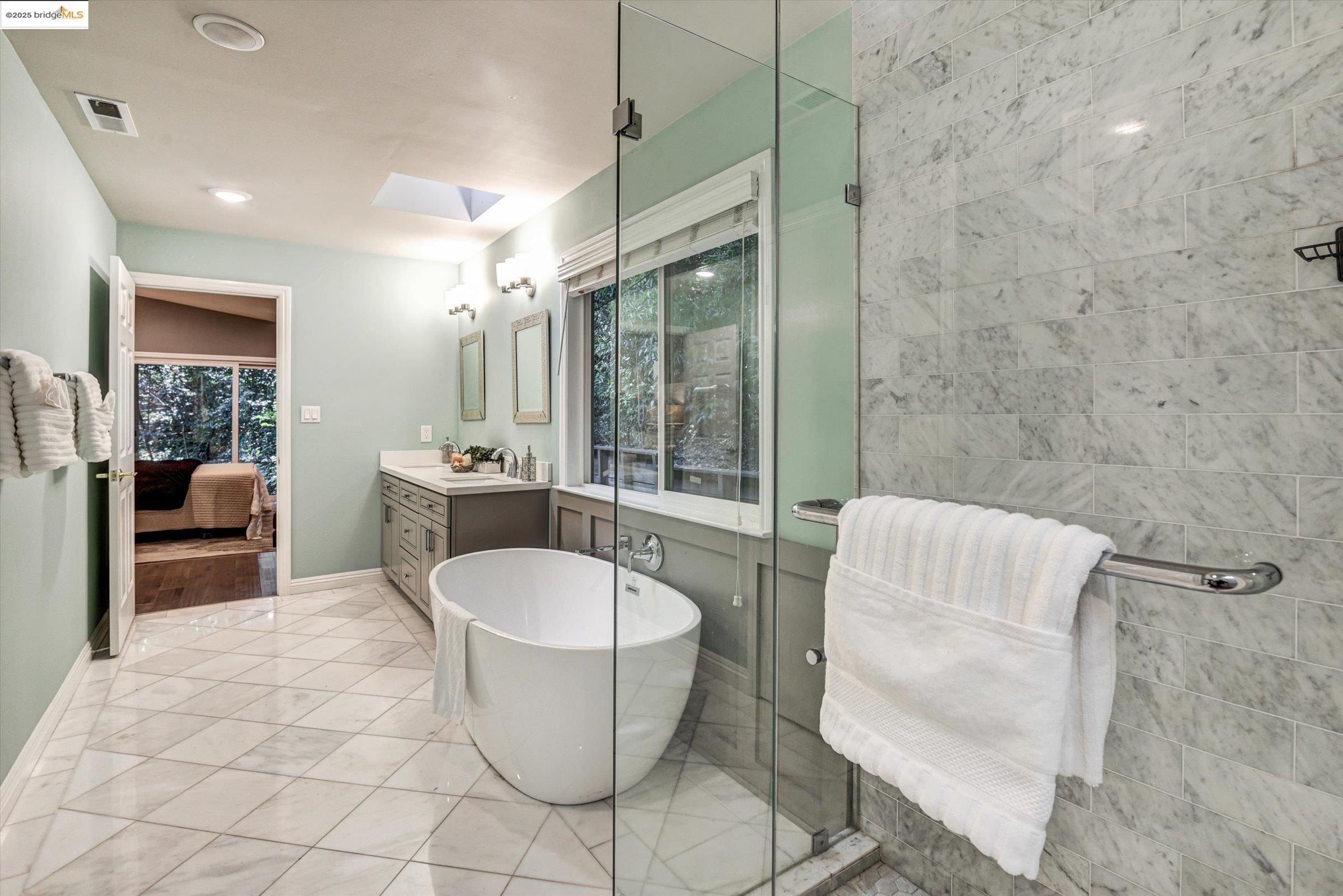 7 St Stephens Drive Orinda, CA 94563 - Photo 16 of 27 a living room with furniture a table and a potted plant