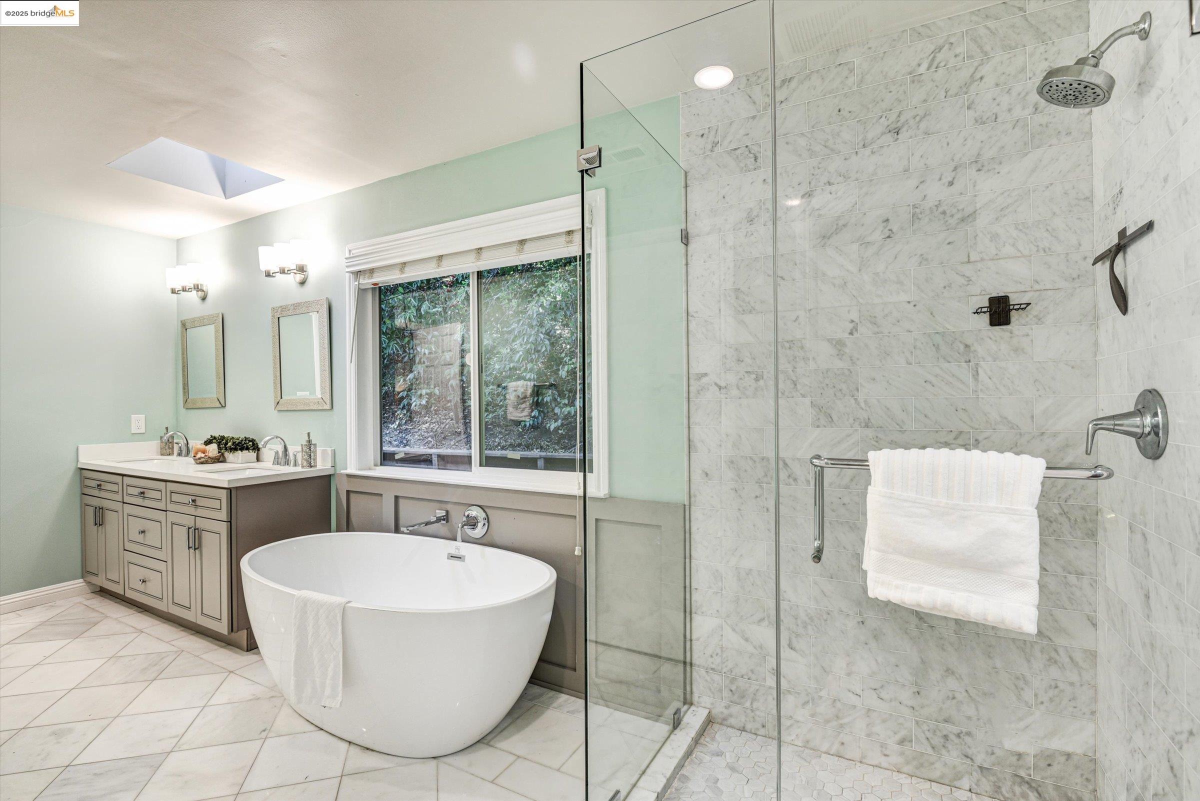 7 St Stephens Drive Orinda, CA 94563 - Photo 17 of 27 a bathroom with a tub sink and mirror