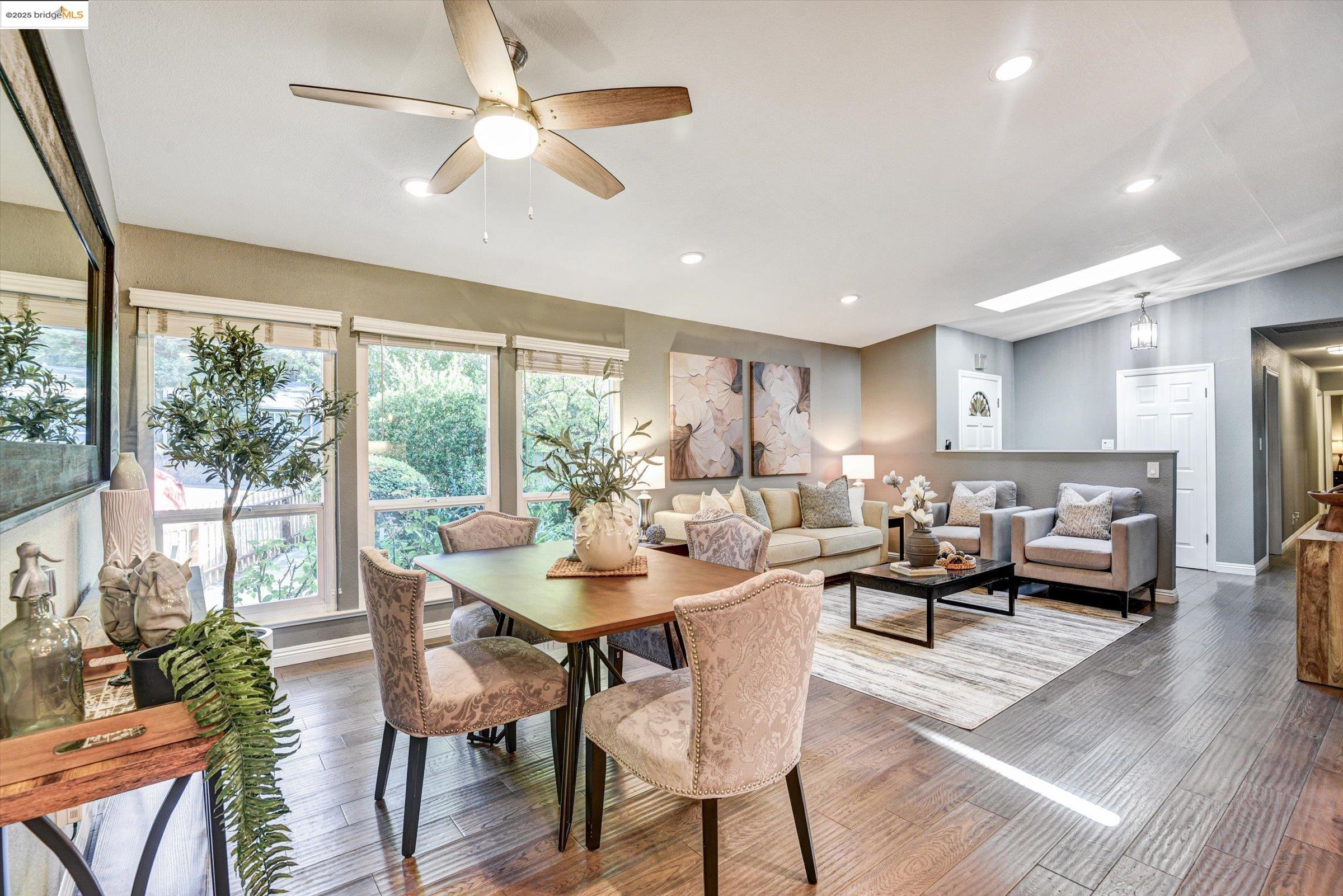 7 St Stephens Drive Orinda, CA 94563 - Photo 6 of 27 a living room with furniture and a large window