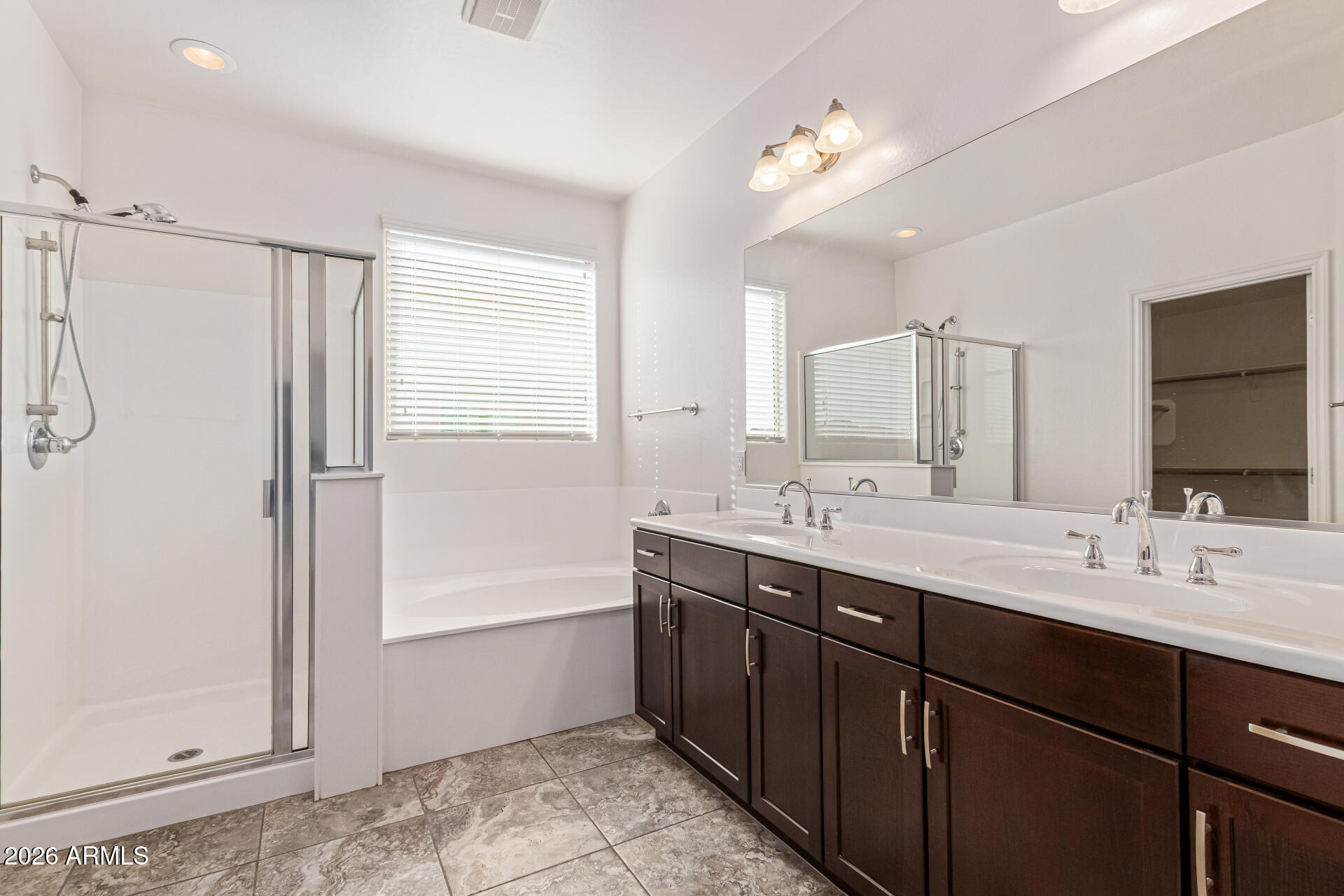 32187 North Royce Road San Tan Valley, AZ 85144 - Photo 14 of 38 a bathroom with a double vanity sink mirror and double