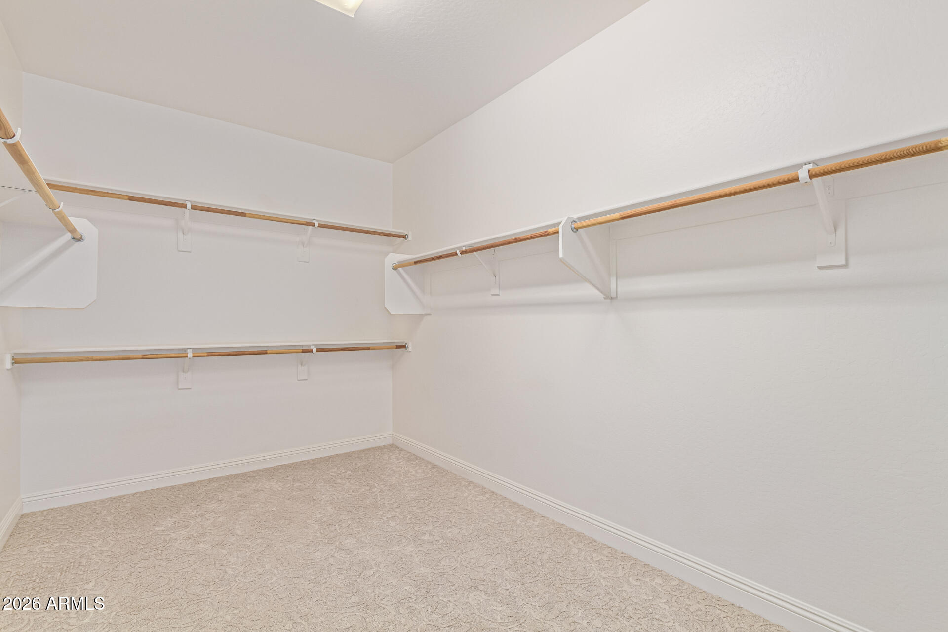 32187 North Royce Road San Tan Valley, AZ 85144 - Photo 16 of 38 a view of an empty walk in closet