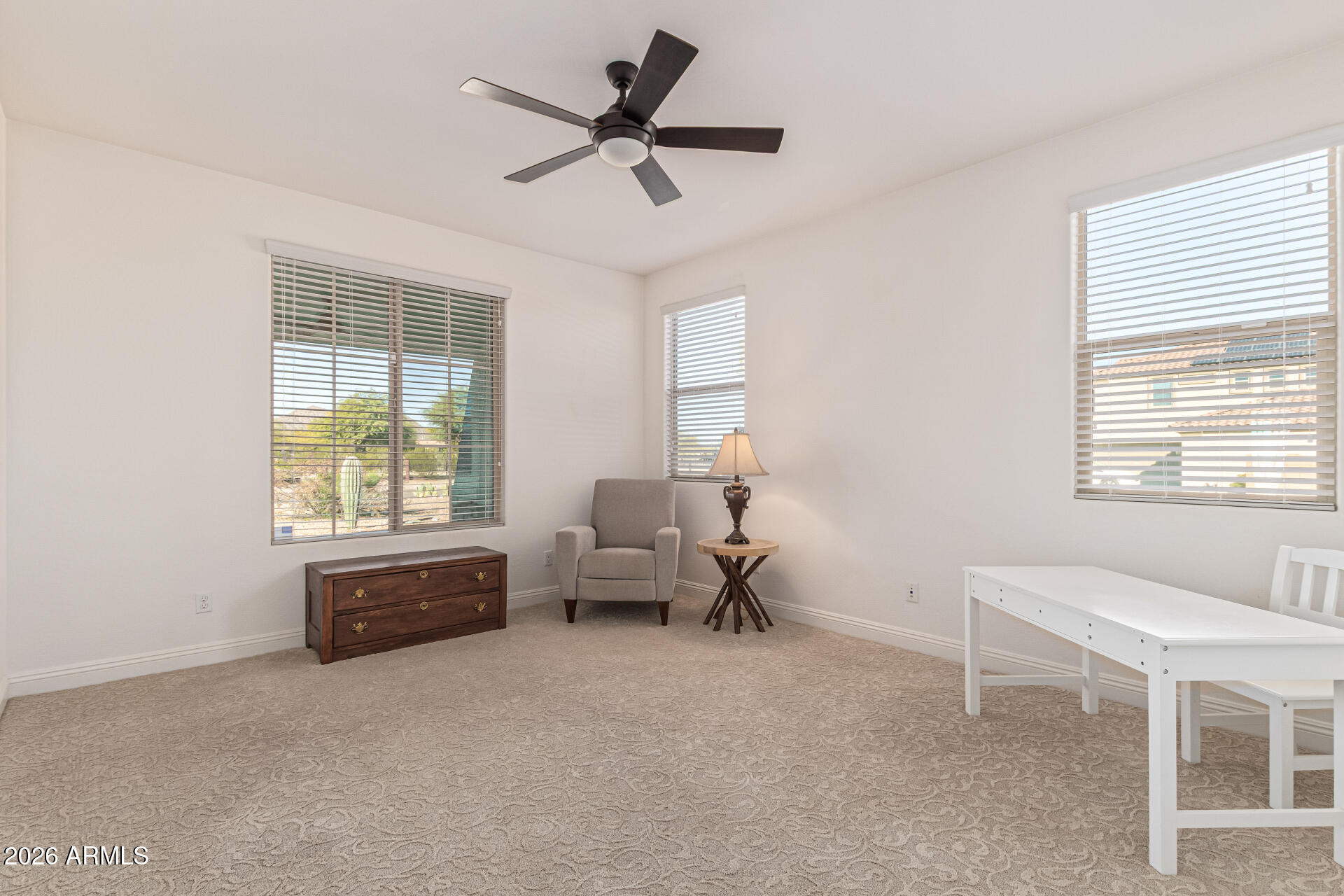 32187 North Royce Road San Tan Valley, AZ 85144 - Photo 18 of 38 a living room with furniture and a window